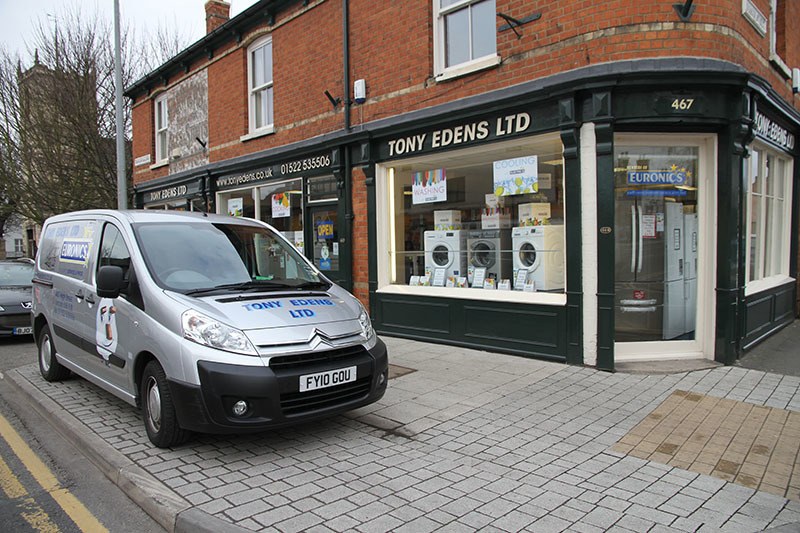 Delivery Van outside of shop.